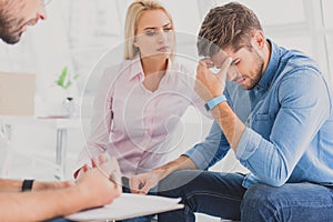 Anxious woman with man in desperation