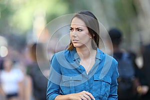 Anxious woman walking on the street