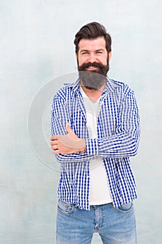 Any length any style. Happy hipster with unshaven beard hair. Unshaven man with bearded smile in casual style