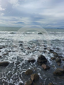 Anyer beach with Krakatoa mountain and blue sky and ocean at Anyer beach