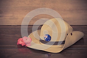 Anzac army slouch hat with Australian Flag on vintage wood