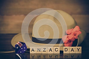 Anzac army slouch hat with Australian Flag on vintage wood