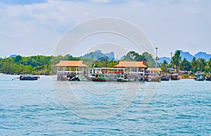 The Ao Nammao Pier with large cruise boats, Ao Nang, Thailand