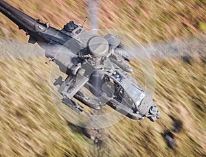 Apache helicopter flying photo