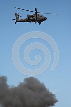 Apache helicopter in a warzone photo