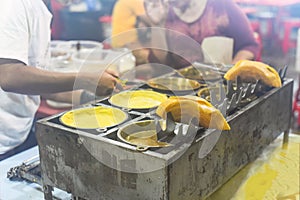 Apam Balik or Apom Balik traditional Malaysian pancake in Jalar Alor street food in Kuala Lumpur