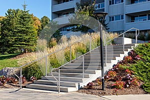 Apartment building entrance with plants and flowers. Residential house in Ottawa, Canada