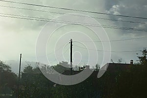 The apartment building is in front of a thick layer of fog. Living in a mountainous area in the Carpathians, Ukraine