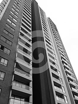 Apartment building with modern style. Gray scale with architectural details.