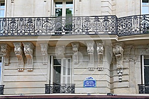 Apartment building with ornate 19th century architecture typical of central Paris