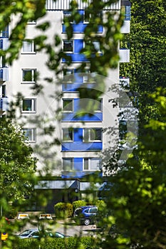 Apartment building with parked cars