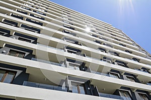 Apartment building seen from a low angle photo