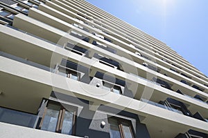 Apartment building seen from a low angle photo