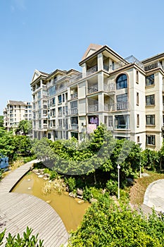 Apartment building in suburban area photo