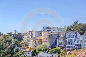 Apartment buildings surrounded by trees in San Francisco, California