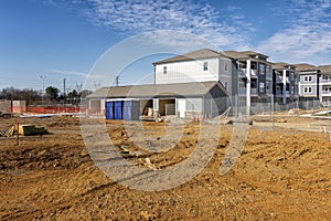 Apartment Complex Construction Site With Porta Potties or Portable Toilets