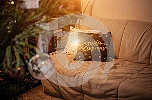 Apartment decorated with Christmas pillows. Cozy festive background