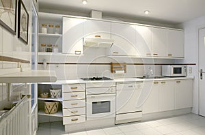 Apartment kitchen interior in white tone