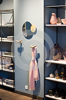 Apartment with modern armchairs and blue wall