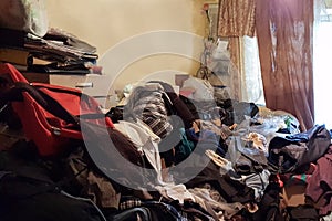 Apartment of a pensioner who suffers from compulsive hoarding, littered with trash and books