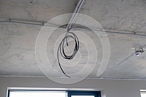 Apartment renovation. Electrical wiring. Wiring electrical cables on wall