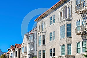 Apartment and rowhouse buildings with european style exterior in San Francisco, CA
