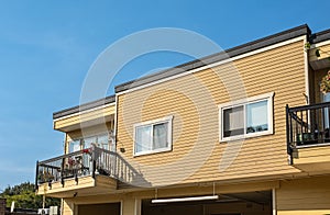Apartments building against blue sky. Residential townhouses. Modern apartment buildings in BC Canada