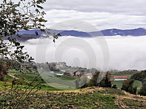 Apennine landscape with clouds and fog photo