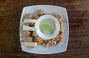 An aperitif with vegetables and cheese