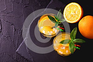 Aperitif with vodka, orange juice and mint. Screwdriver cocktail