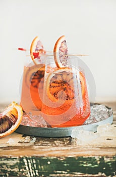 Aperol Spritz cocktail drink with orange and ice, copy space