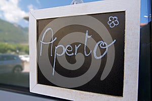 Aperto inscription on a blackboard photo