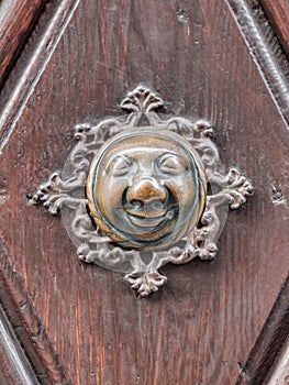 Apfelweibla, Vintage doorknob on antique door