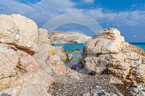 Aphrodite Beach with Stone Rocks in Aphrodite bay of Mediterranean sea water photo