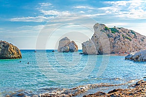 Aphrodite Beach with Stone Rocks in Aphrodite bay of Mediterranean sea water photo