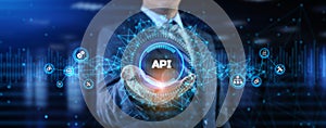 API Application programming interface. Businessman pressing virtual button