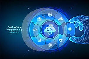 API. Application Programming Interface. Software development tool, cloud computing technology concept. Wireframe hand places an
