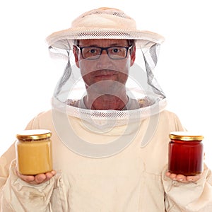 Apiarist with honey glasses