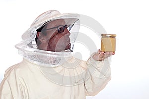 Apiarist with white clothes