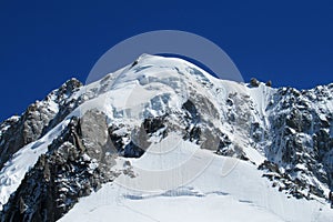 Apline rocky and snow mountain on Montblanc, Chamonix