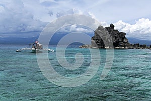 Apo island outrigger dive boat philippines