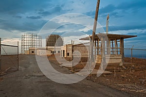 Apocalypse landscape. Military radar and barracks photo