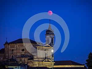 Apocalyptic red moon eclipse over the church of Trezzo sull`Adda photo