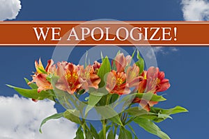 We Apologize message with a orange and yellow lilies bouquet