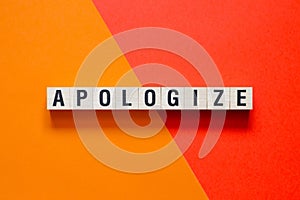 Apologize word concept on cubes