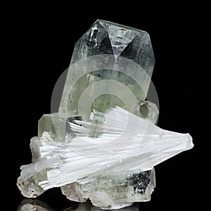 Apophyllite crystal with a bright white cluster of Scolecite photo