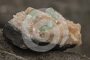 apophyllite and stilbite mineral sample on black background