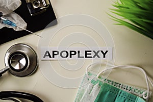 Apoplexy with inspiration and healthcare/medical concept on desk background