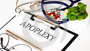 APOPLEXY text and Background of Medicaments, Stethoscope photo