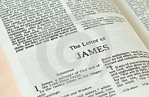 Apostle James epistle letter open Holy Bible Book close-up photo